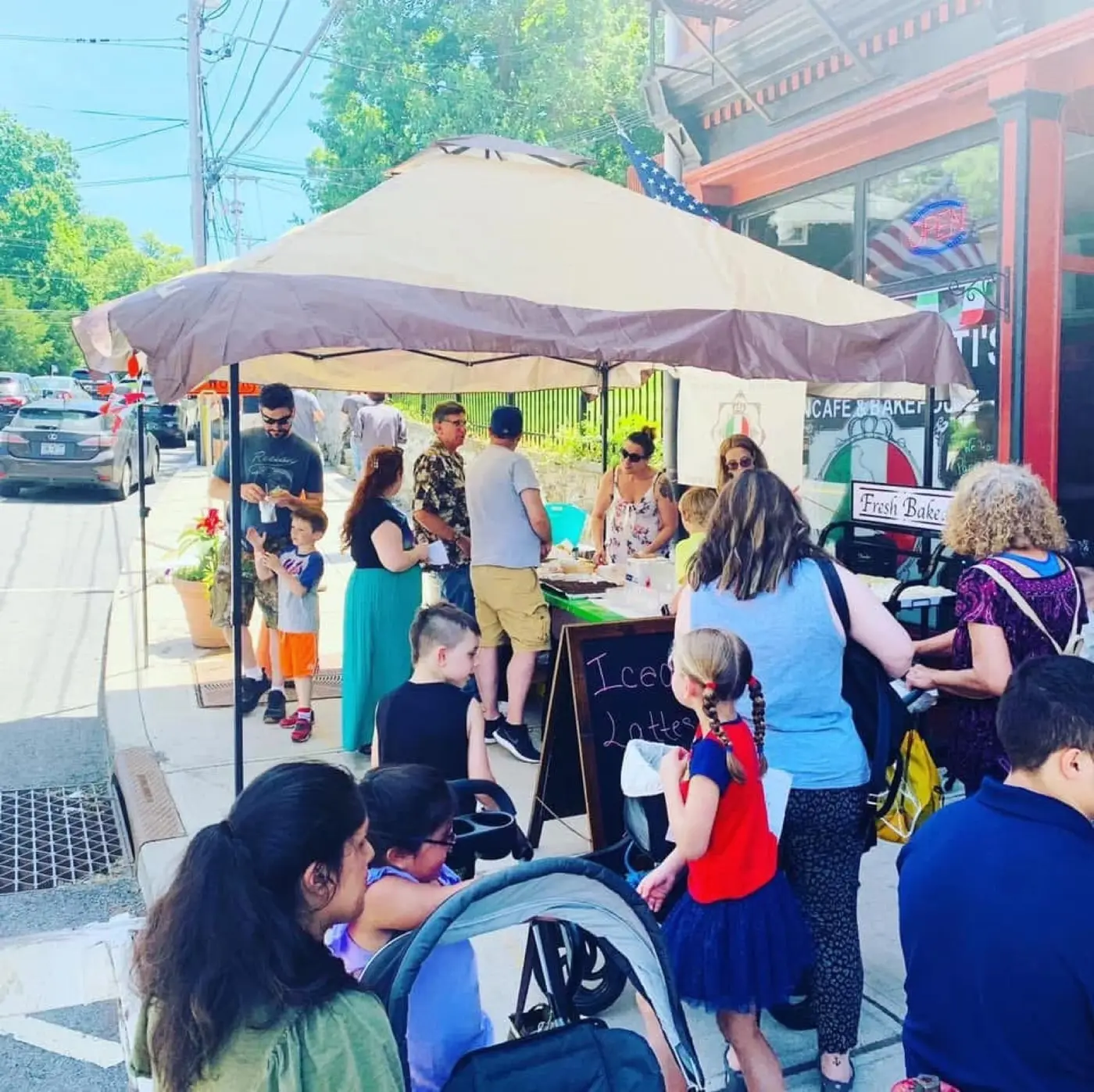 A crowd at a Musetti’s pop-up tent